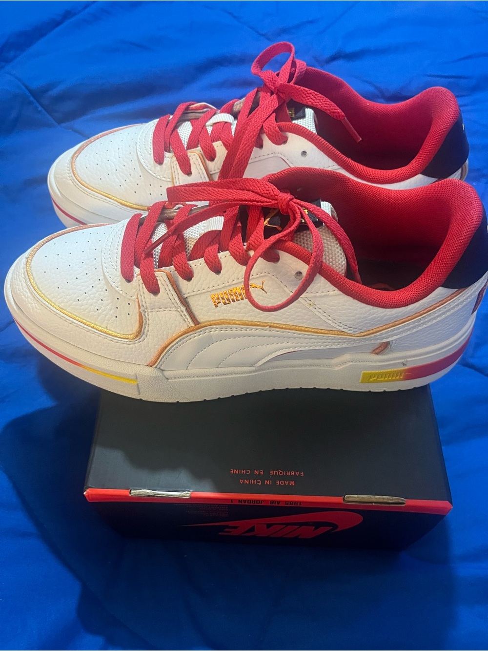 Puma  Men White Sneakers with Red and Yellow Trim
